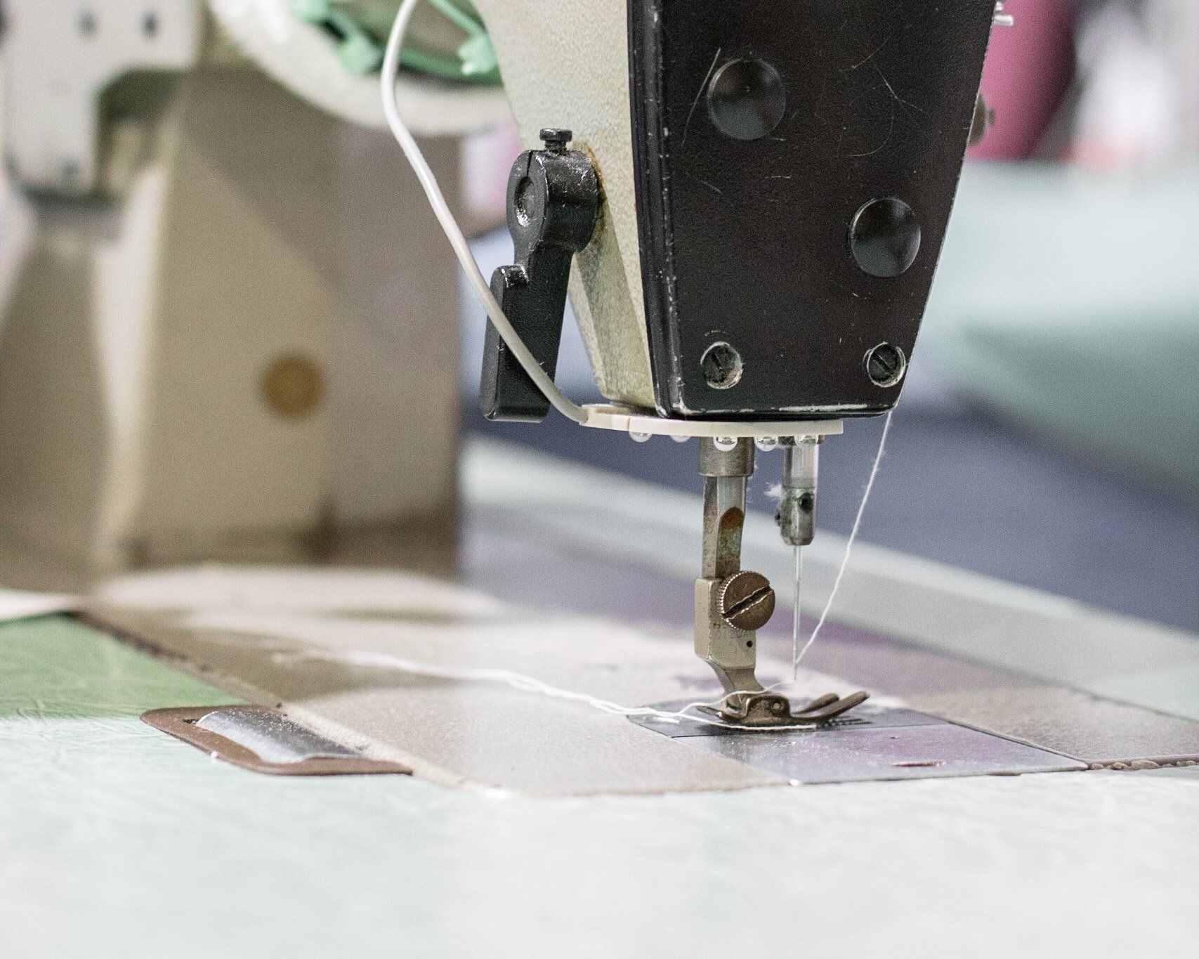 Garment repairs and mending performed by sewing machine